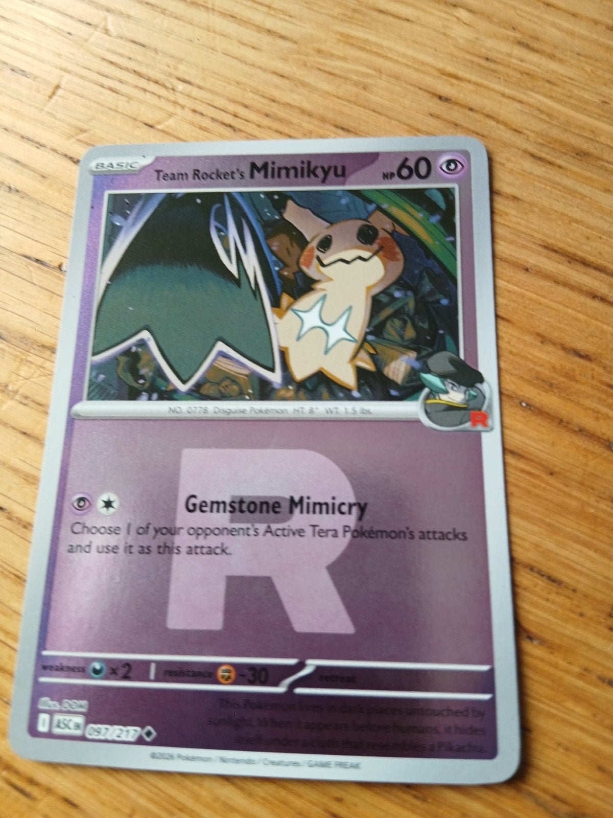 Pokémon Kaart: Team Rocket's Mimikyu (097/217), Ophalen of Verzenden, Zo goed als nieuw, Losse kaart