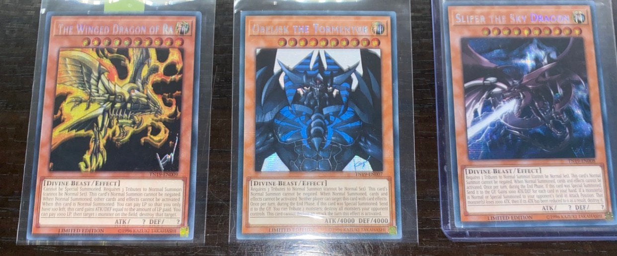 Yu-Gi-Oh! Egyptian God Card Set TN19 Promo !, Ophalen of Verzenden, Zo goed als nieuw, Meerdere kaarten, Foil