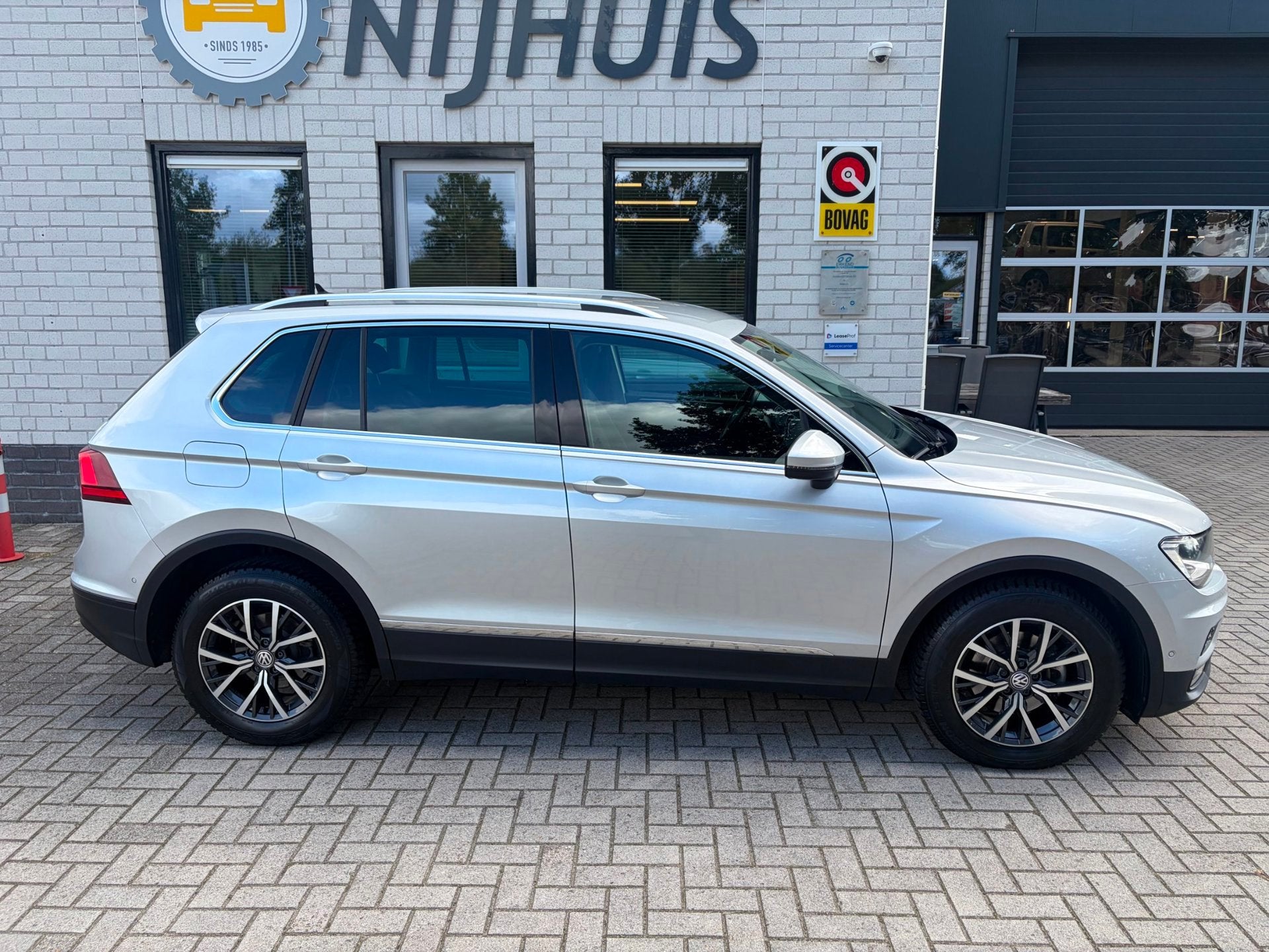 Volkswagen Tiguan 1.5 TSI ACT Comfortline Business / Navigat, Auto's, 15 km/l, 4 cilinders, 150 pk, Automatische klimaatregeling
