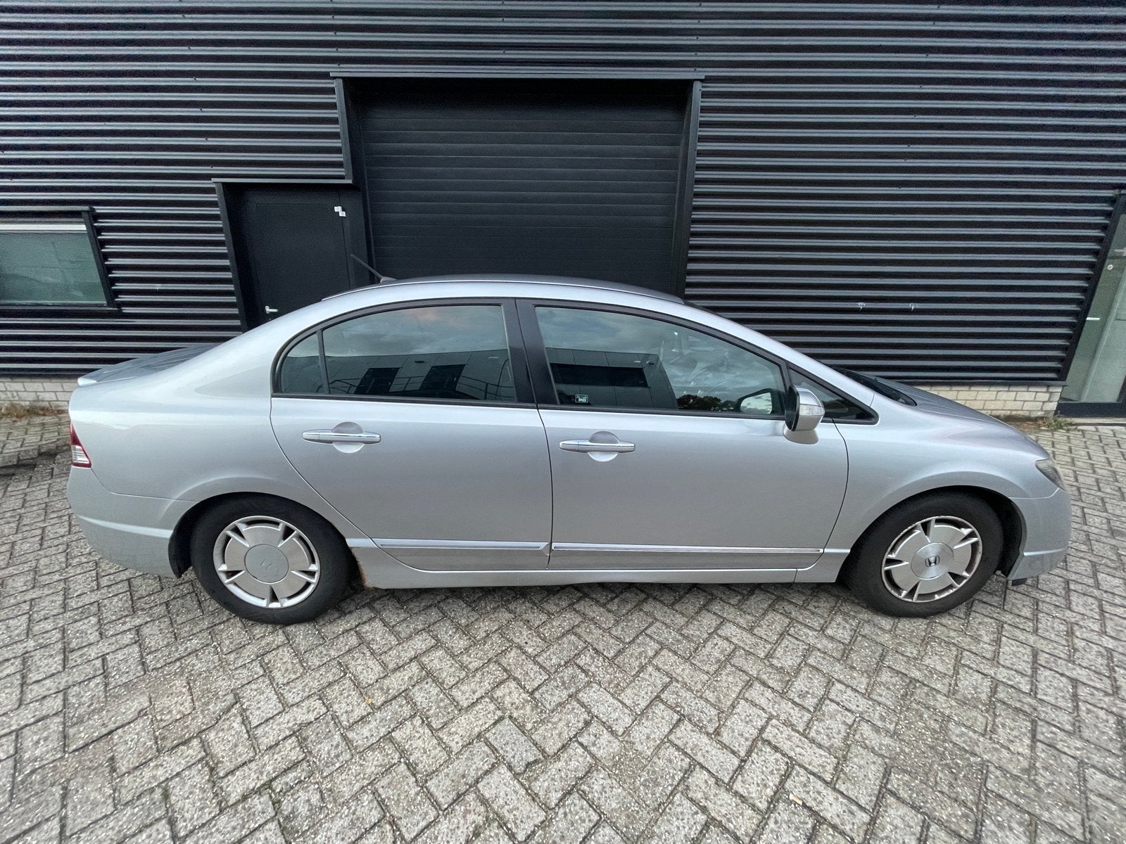 Honda Civic 1.3 Vtec Hybrid 4DR C-tr. 2009 Grijs, Stof, Origineel Nederlands, Grijs, 22 km/l