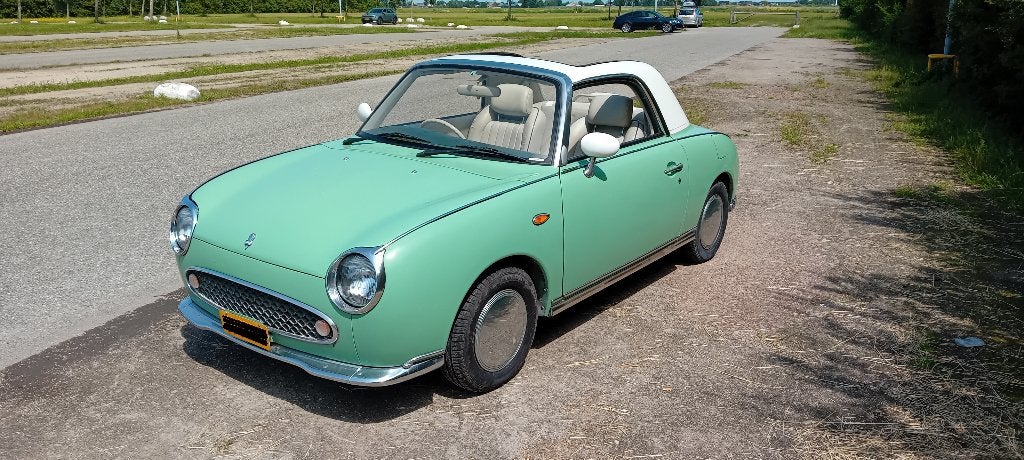 Te koop: Nissan Figaro, Auto's, Cabriolet, 0 kg, Leder, Particulier