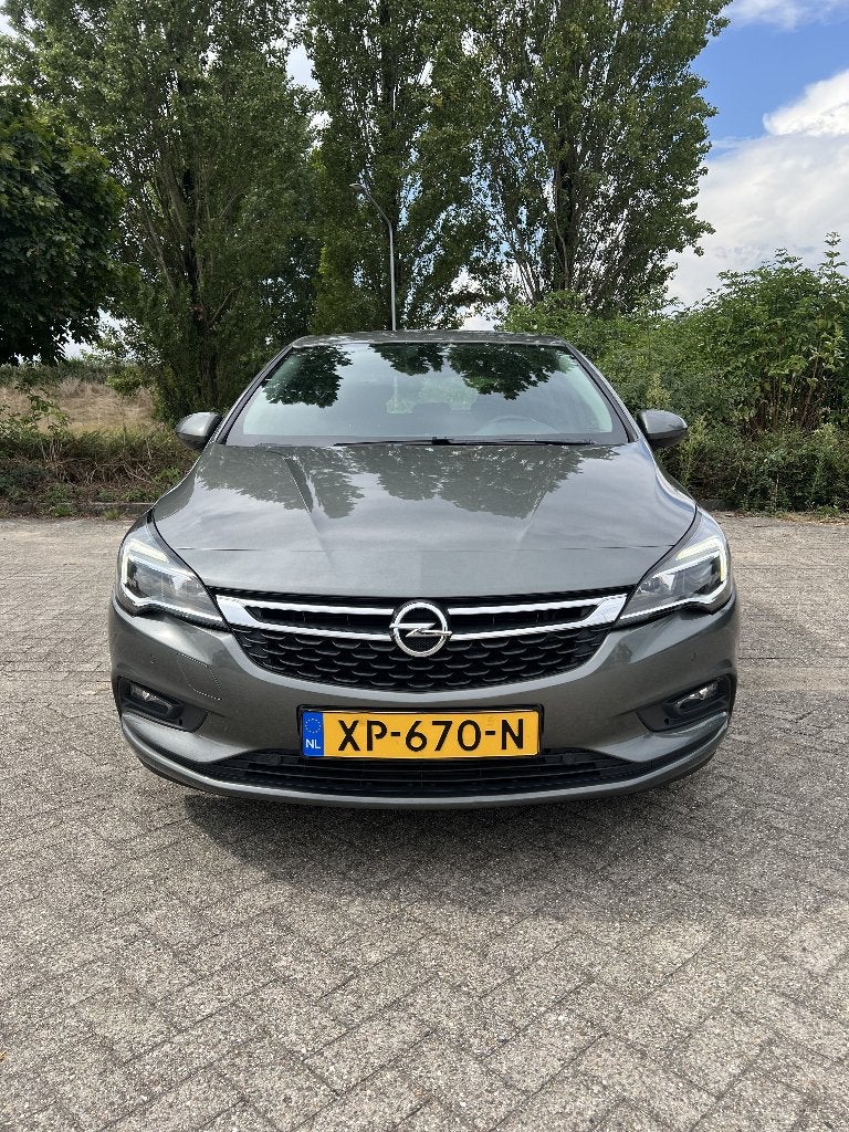 Opel Astra 1.4 Turbo 150pk Start/stop Aut 2017 Grijs, Euro 5, Stof, Zwart, 620 kg