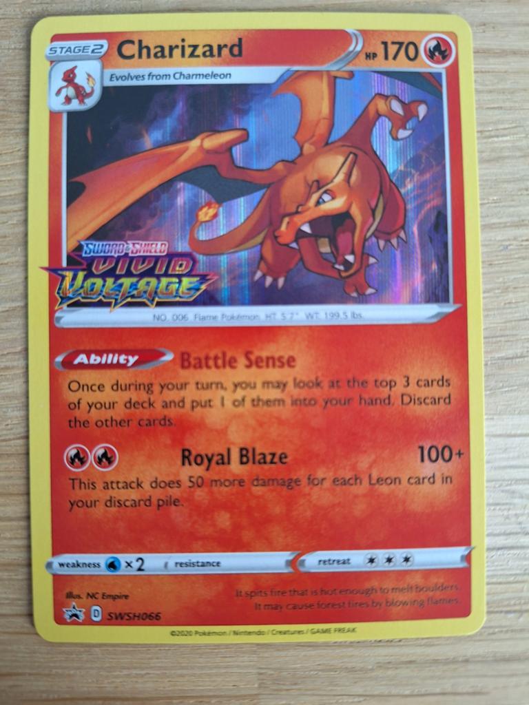 Charizard SWSH066 Holo Vivid Voltage Stamped Mint Conditie, Ophalen of Verzenden, Zo goed als nieuw, Losse kaart, Foil