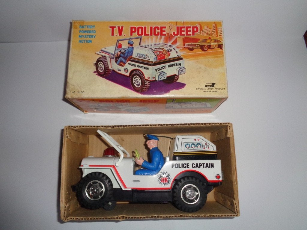 Oude blikken Junior Toys T.V. Police Jeep met doos. Japan, Ophalen of Verzenden, Gebruikt