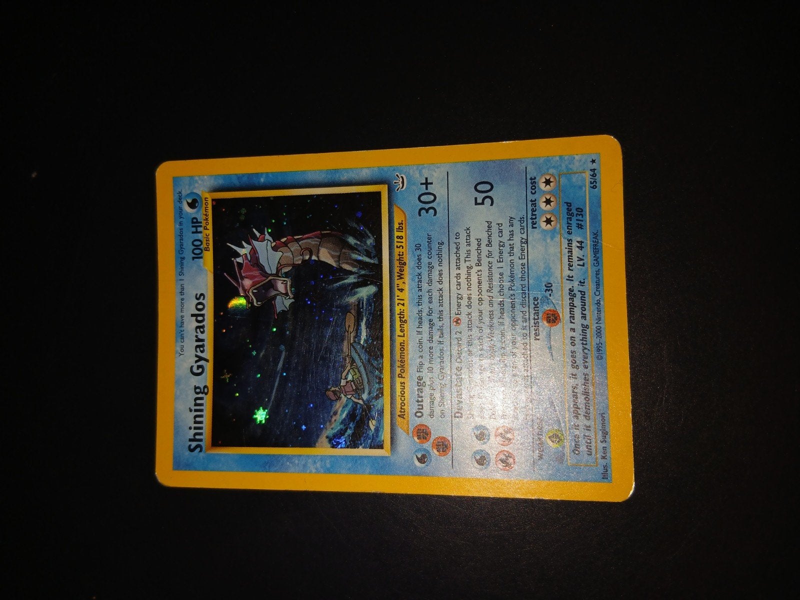 shining gyarados, neo relevation 65/64, Hobby en Vrije tijd, Verzamelkaartspellen | Pokémon, Ophalen of Verzenden, Zo goed als nieuw