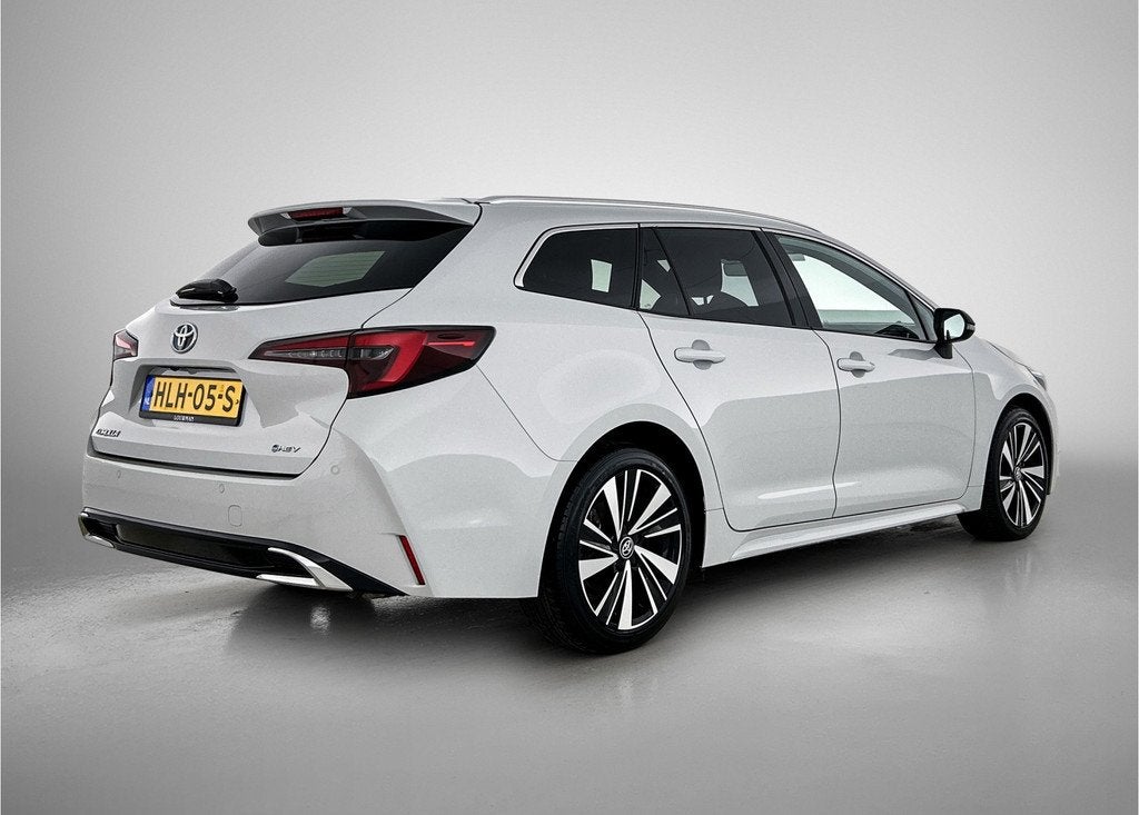 Toyota Corolla Touring Sports Hybrid 140 Dynamic | NL dealer, Auto's, Toyota, 12 maanden, 450 kg, Gebruikt, 4 cilinders