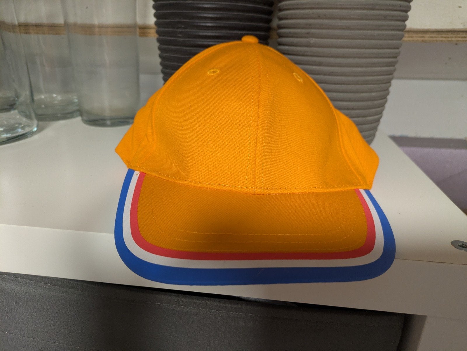 Hema Holland Pet - Oranje - Nooit Gedragen, Kleding | Dames, Hema, One size fits all, Ophalen of Verzenden, Pet