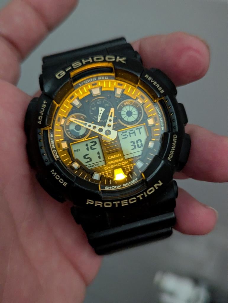 Casio G-Shock GA-100GBX-1A9 (Black & Gold) Perfect, Sieraden, Tassen en Uiterlijk, Horloges | Heren, Ophalen of Verzenden, Zo goed als nieuw