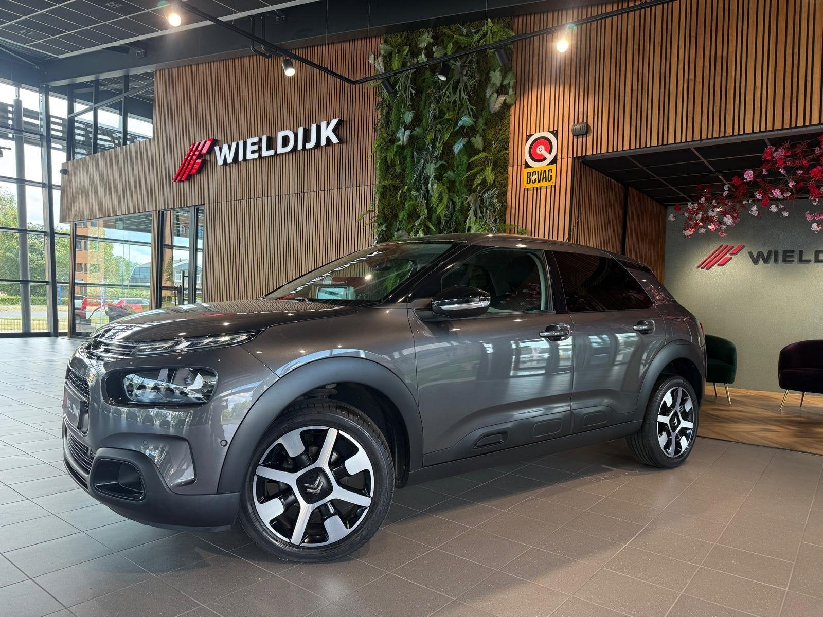Citroen C4 Cactus 1.2 PureTech Shine Keyless camera trekhaak, Auto's, Citroën, Voorwielaandrijving, Stof, Gebruikt, Euro 6