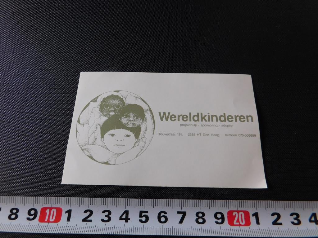 sticker Wereldkinderen  Den Haag, Ophalen, Zo goed als nieuw
