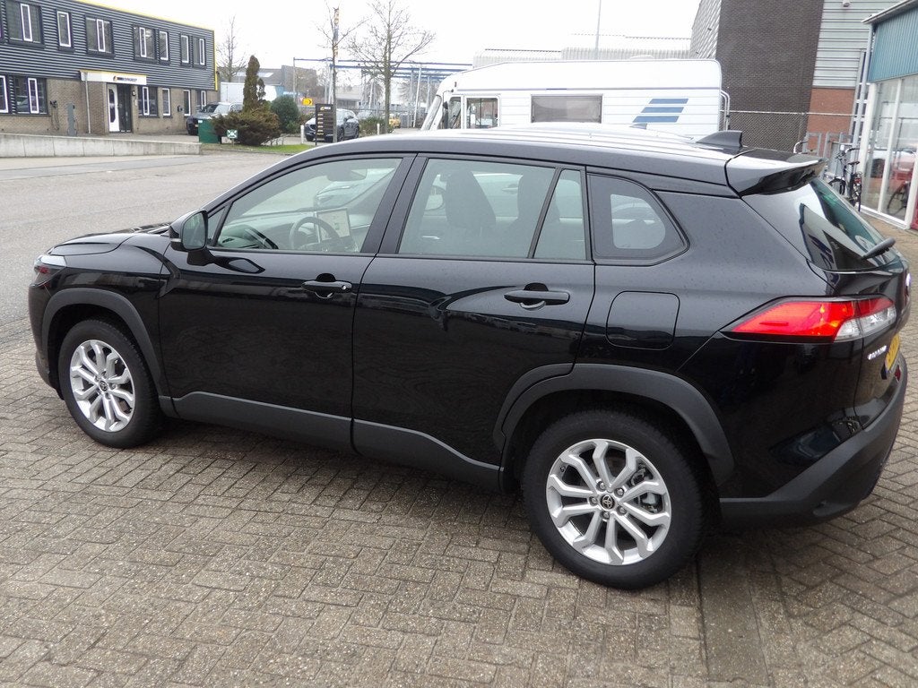Toyota Corolla Cross 2.0 High Power Hybrid Active (bj 2023), Auto's, Gebruikt, 4 cilinders, Zwart, Origineel Nederlands