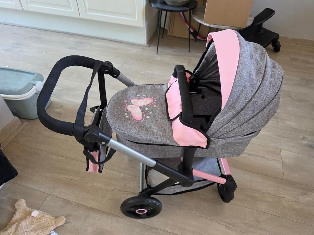 Leuke poppenwagen met vlinderdesign - Zo goed als nieuw, Kinderen en Baby's, Kinderwagens en Combinaties, Ophalen, Zo goed als nieuw