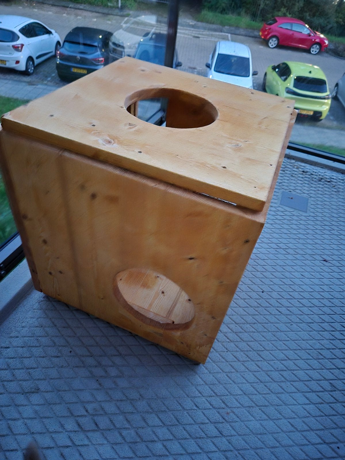 houten katten kubus, Ophalen