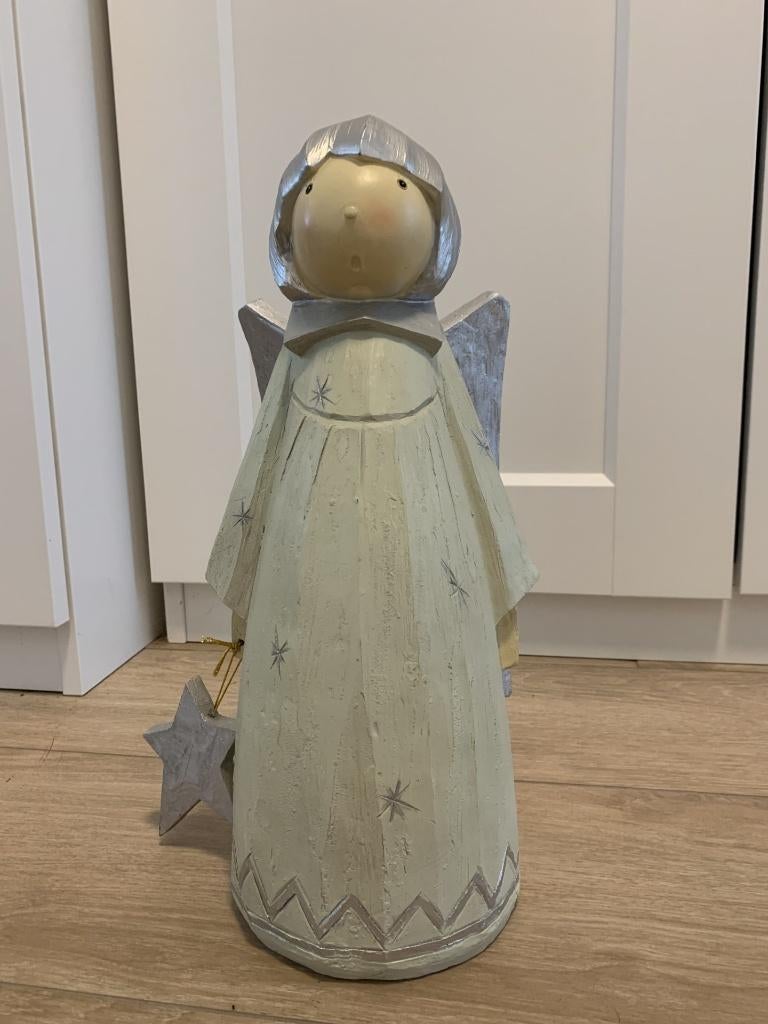 Houten kerst engel, Ophalen