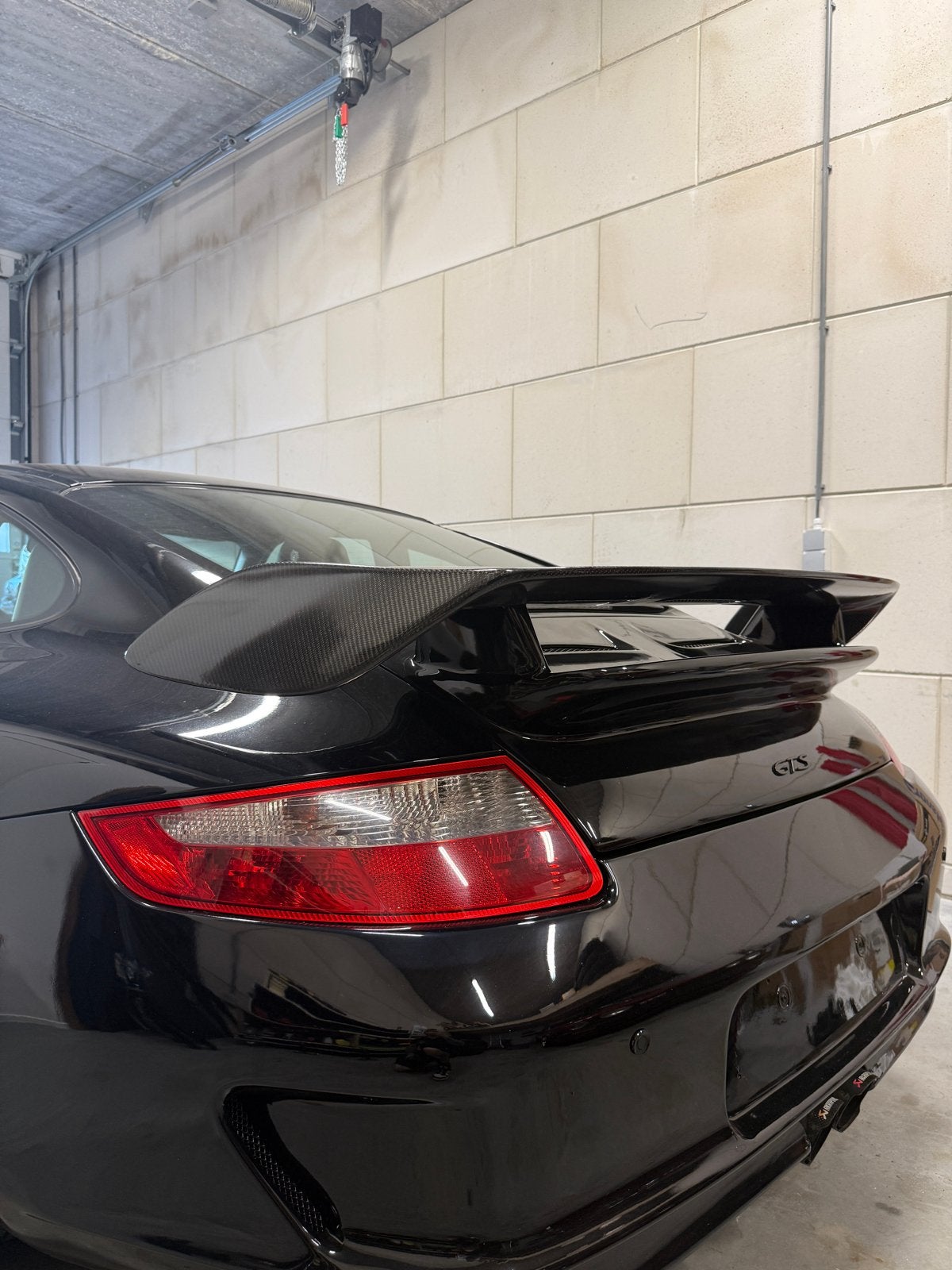 Porsche 997 Carbon Achterspoiler, Ophalen