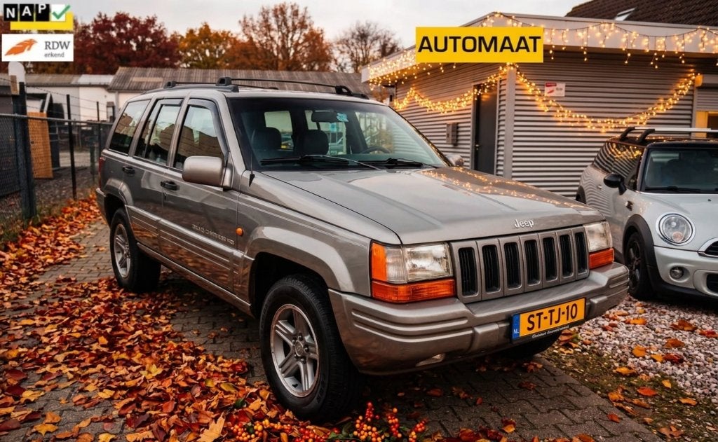 Jeep Grand Cherokee 4.0 I AUT 1998 Grijs TREKHAAK!! NWE APK!, Automaat, Zwart, Verwarmde buitenspiegels, Vierwielaandrijving