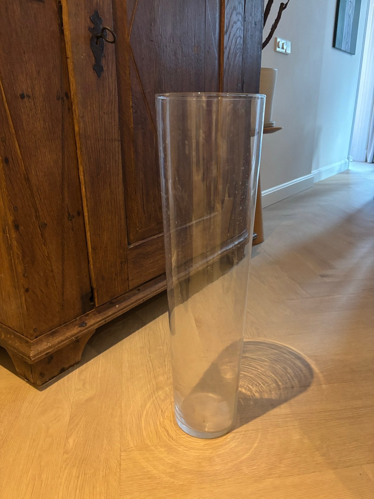Grote glazen vaas (90 cm hoog, 19 cm diameter), Ophalen