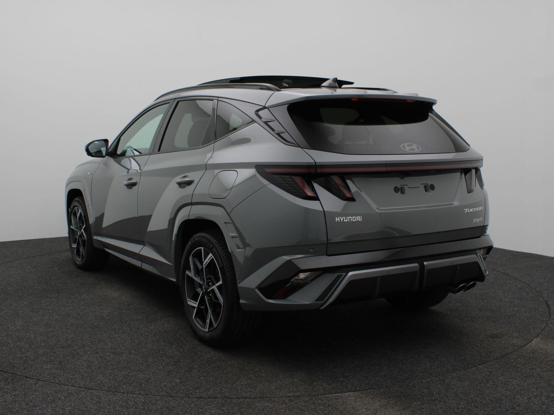 Hyundai Tucson 1.6 T-GDI PHEV N Line Sky | Extra Voordeel |, Auto's, 14 kWh, 4 cilinders, Lichtsensor, Plug-in hybride