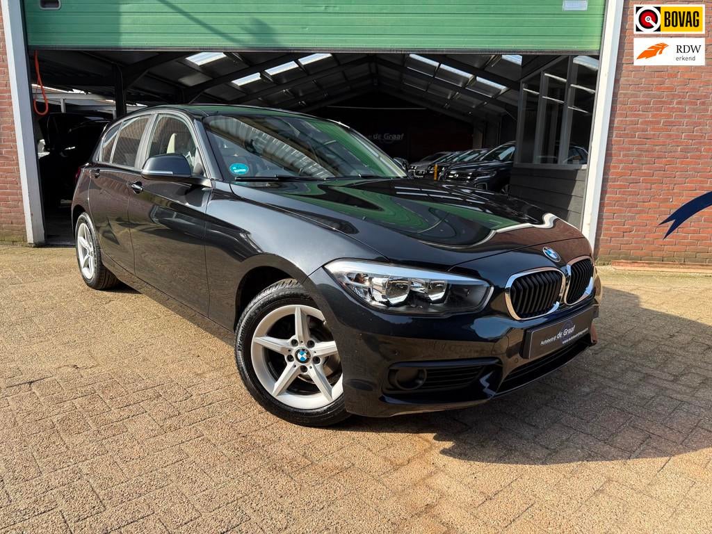 BMW 1-serie 118i Executive|AUTOMAAT/CRUISE/NAVI/LED/LEDER/PD, Auto's, Gebruikt, 1295 kg, Zwart, Leder