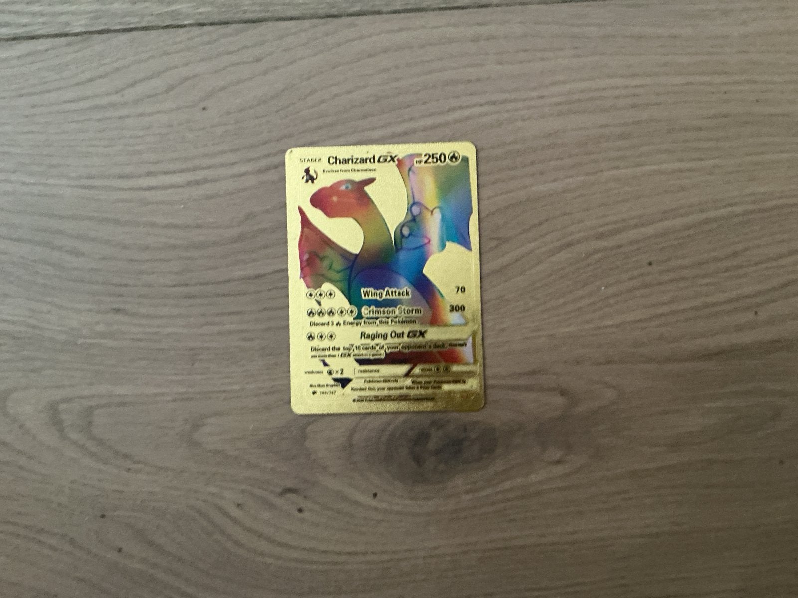 Charizard GX Pokémon Kaart - Gouden Editie, Ophalen of Verzenden, Zo goed als nieuw, Losse kaart, Foil