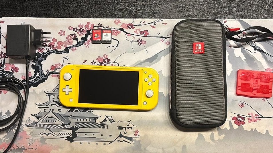 Zo goed als nieuwe Nintendo switch lite met 2 games, Met games, Ophalen of Verzenden, Zo goed als nieuw, Zonder controller