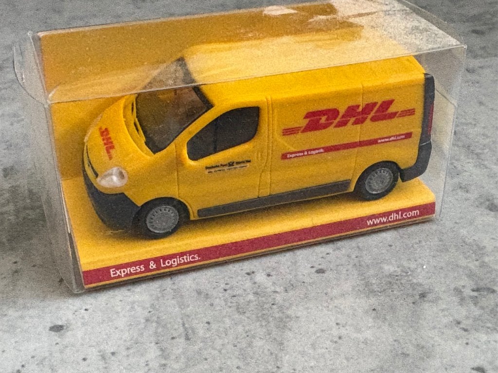 Herpa 1:87 DHL Opel Vivaro, Ophalen of Verzenden, Zo goed als nieuw, Auto, Herpa