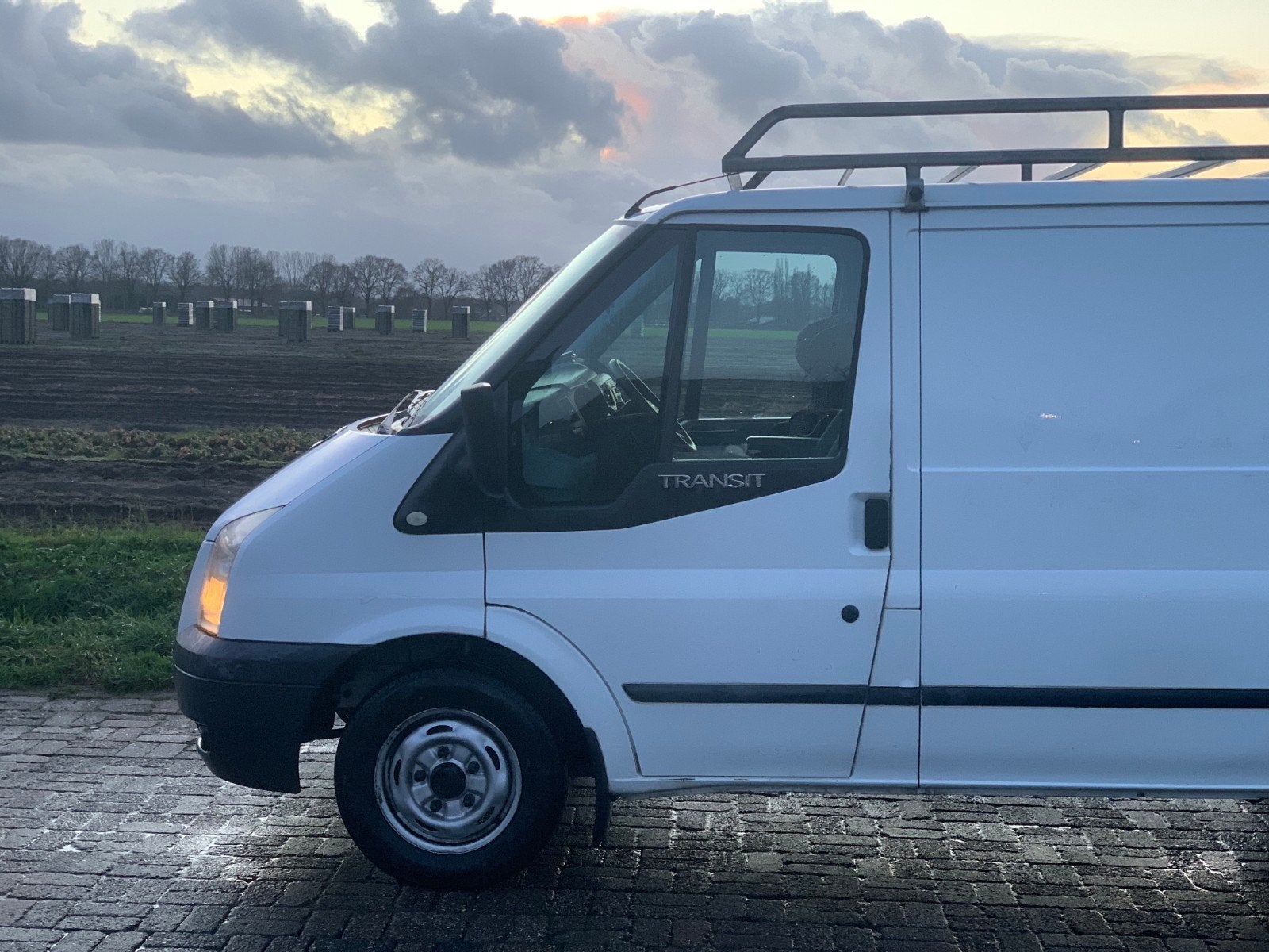 Dakdrager ford transit, Ophalen