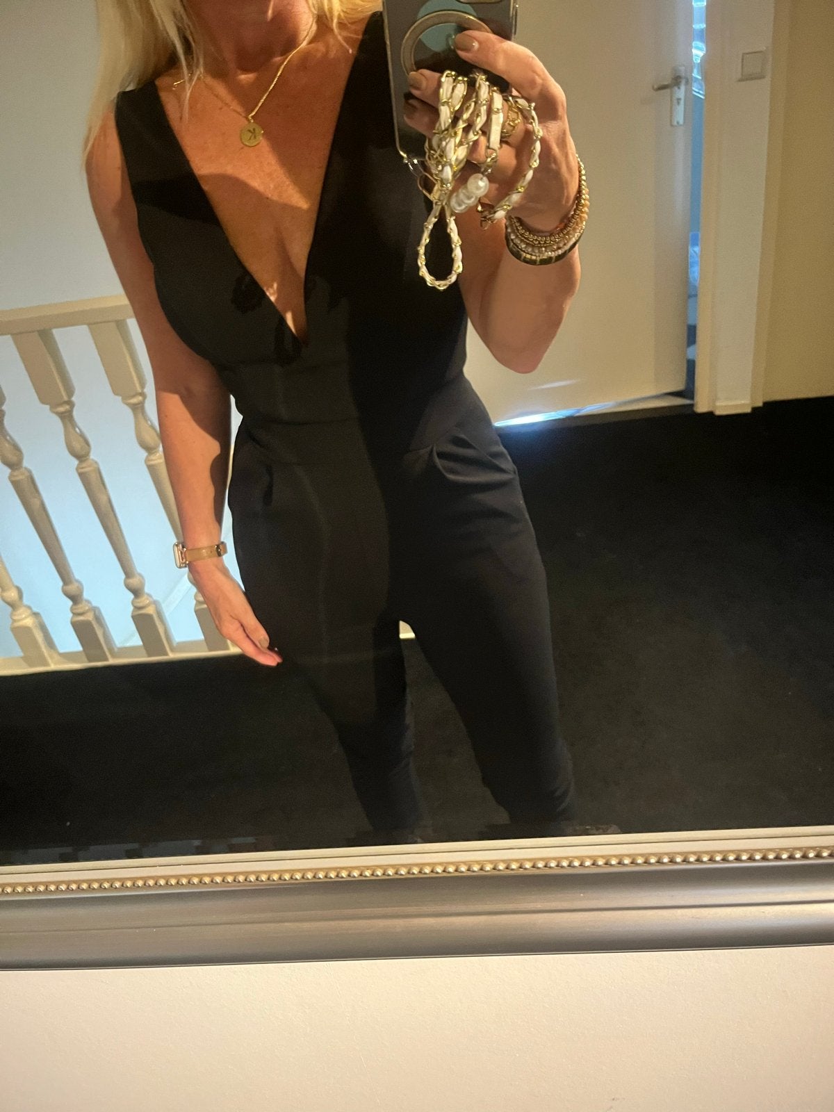 Zwarte jumpsuit met diepe V-hals, Kleding | Dames, Ophalen of Verzenden, Zo goed als nieuw, Maat 36 (S), Zwart