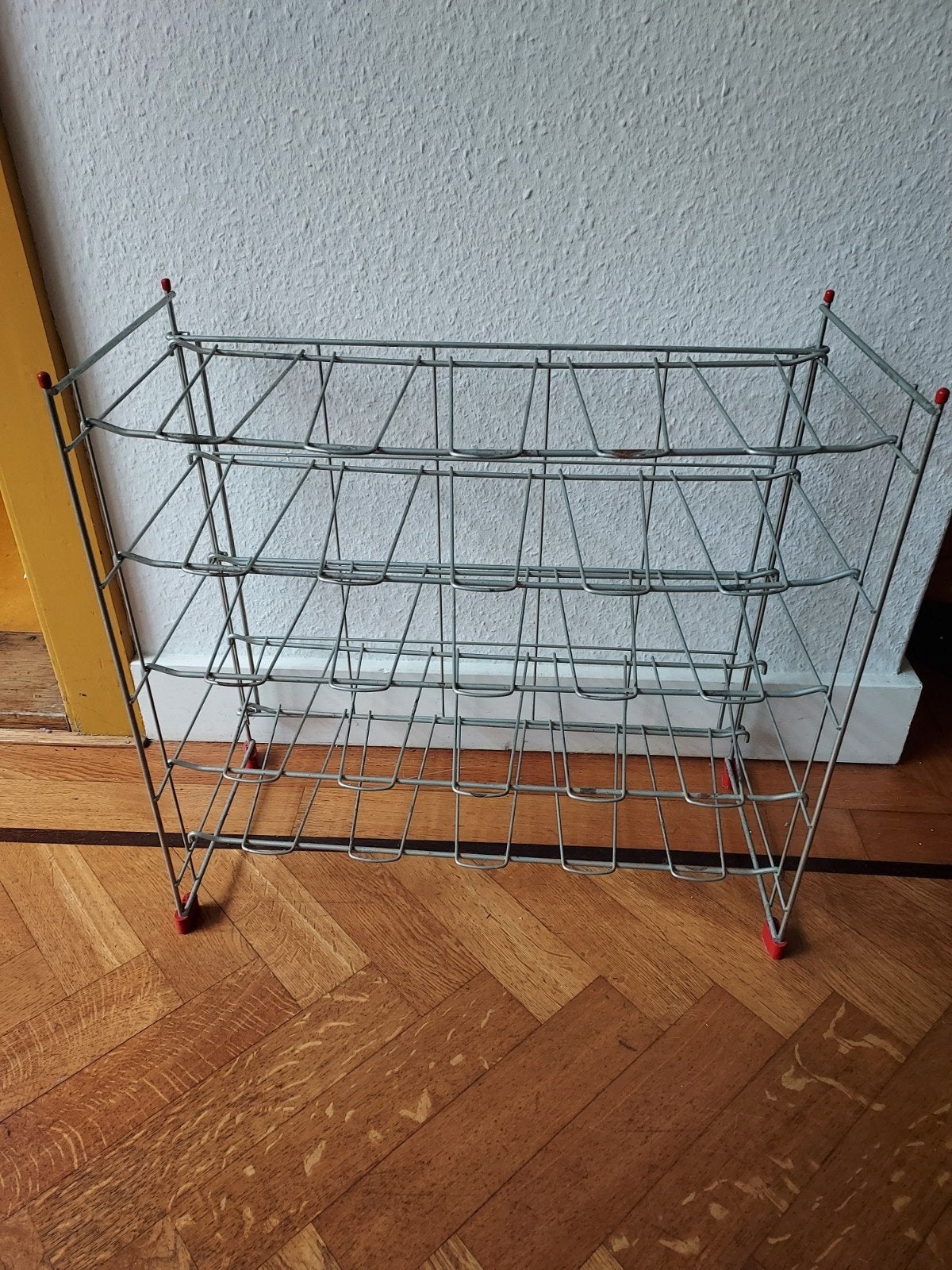Metalen tomado flessenrek, Ophalen