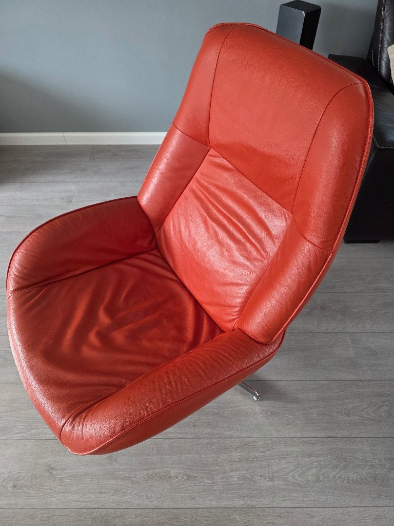 2x oranje lederen relaxfauteuils met RVS onderstel, Ophalen, Gebruikt, 75 tot 100 cm, Leder met RVS