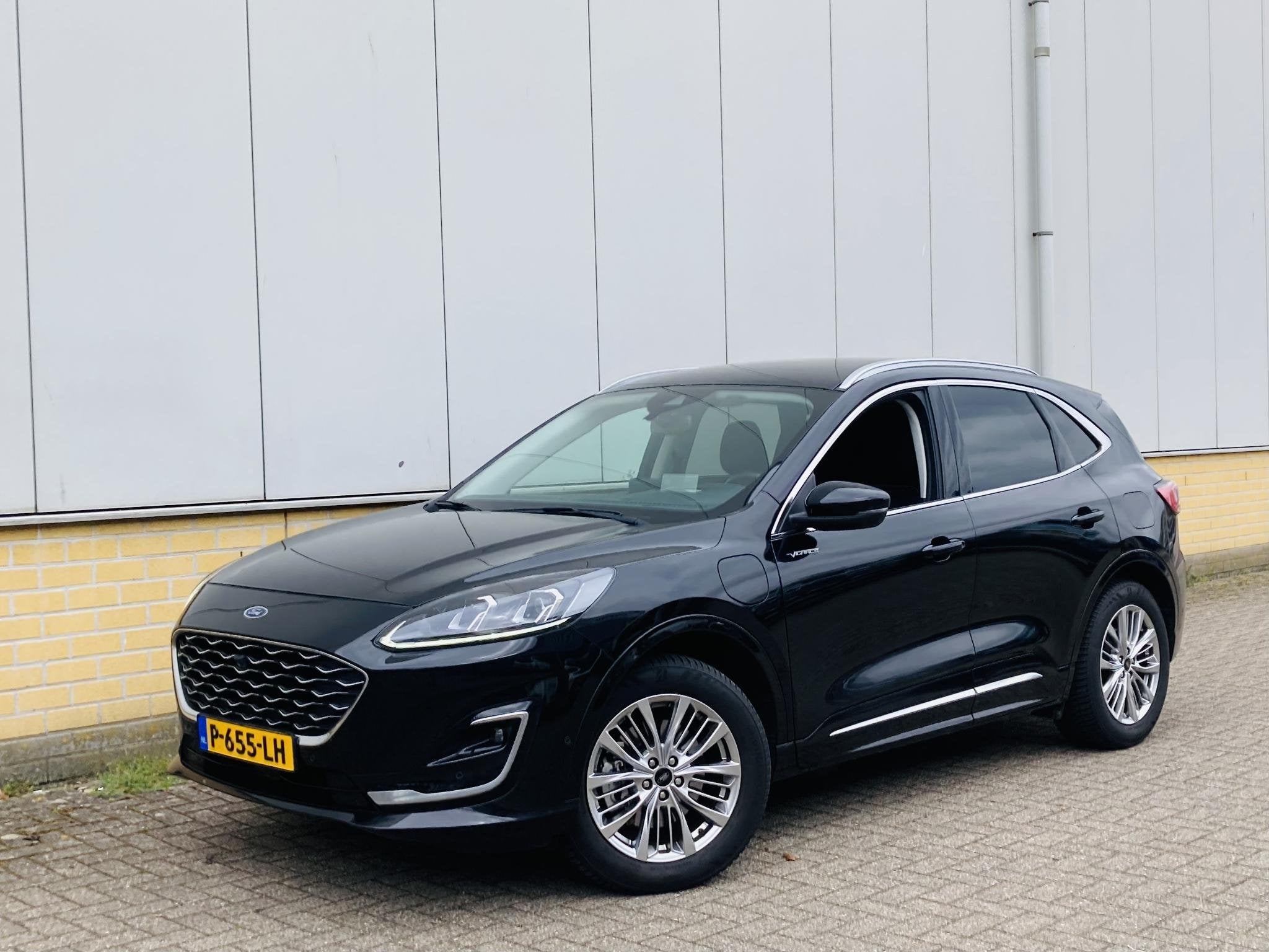 Ford Kuga 2.5 PHEV 225 pk Vignale Lederen bekleding - BLISS, 14 kWh, Gebruikt, 4 cilinders, Zwart