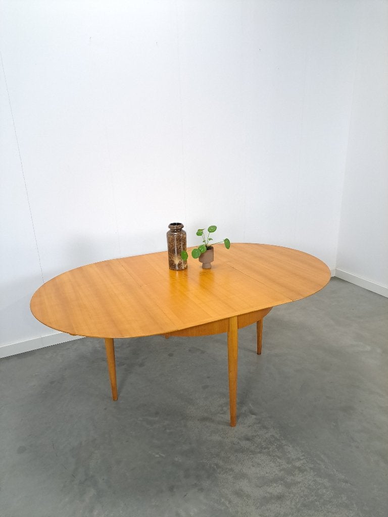 Lübke design uitschuifbare ronde eettafel vintage, Gebruikt, 100 tot 150 cm, Ophalen of Verzenden, Vijf personen of meer
