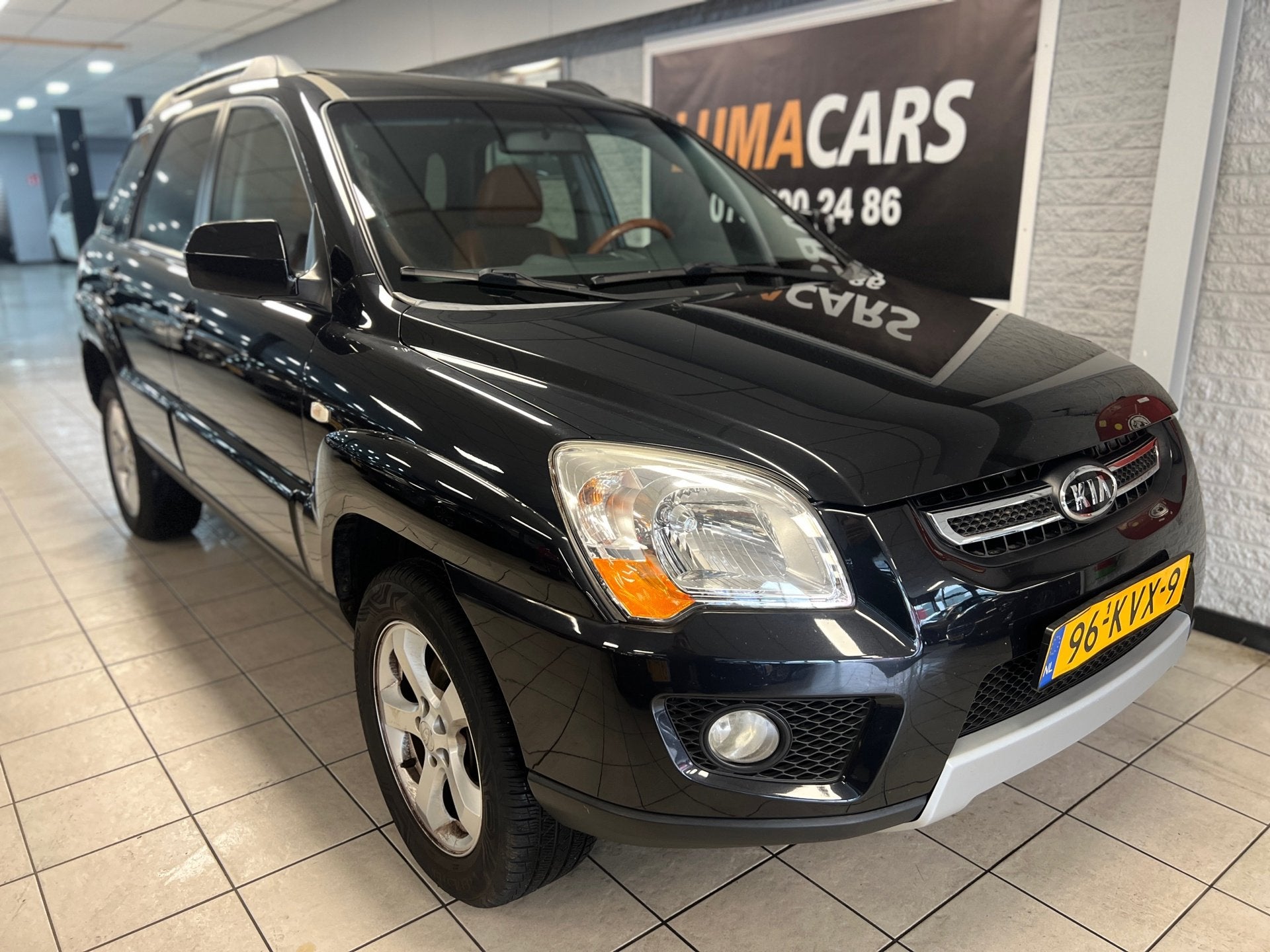 Kia Sportage 2.0 CVVT Fifteen | Pano | Leder | Dealer OH |, Auto's, 1442 kg, Gebruikt, 4 cilinders, Leder en Stof