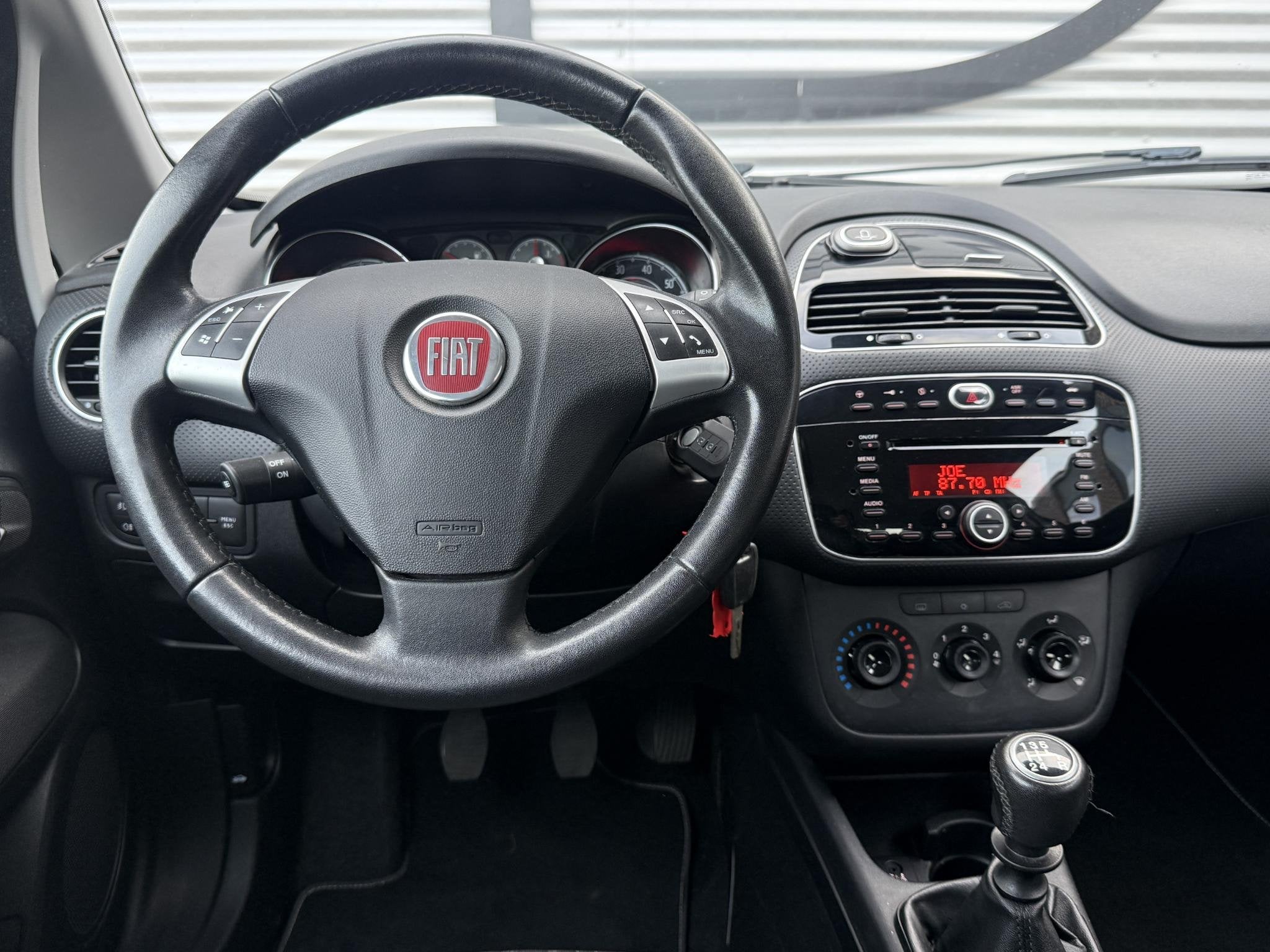 Fiat Punto Evo 1.2 Pop 2e Eigenaar|Airco|Cruise|Elektr. Rame, Auto's, Euro 5, Stof, 1242 cc, 4 cilinders