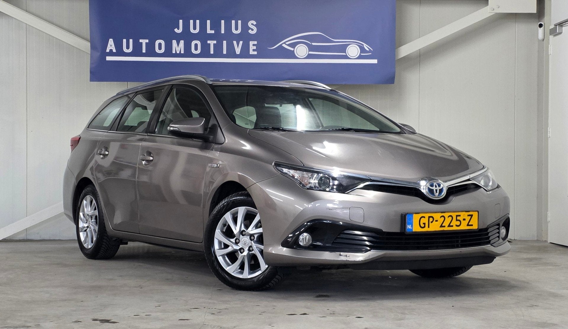Toyota Auris Touring Sports 1.8 Hybrid Aspiration 2e Eigenaa, Auto's, Stof, Gebruikt, Euro 6, Bruin