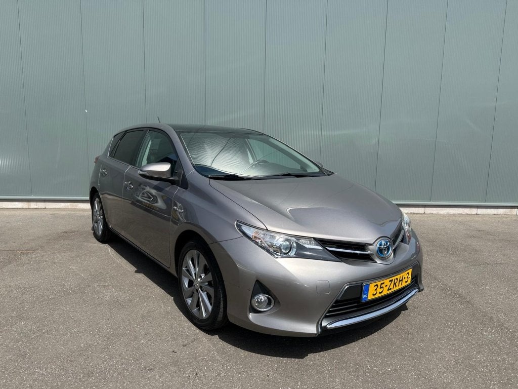 Toyota Auris 1.8 Hybrid Lease PANORAMADAK | CAMERA | NAP !, Auto's, Euro 5, 4 cilinders, Bruin, Origineel Nederlands