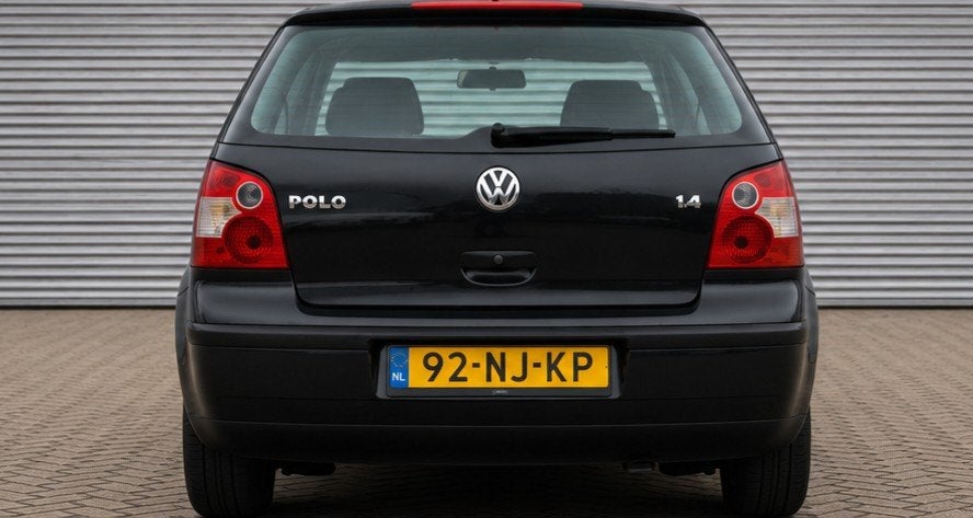 Volkswagen Polo 1.2 47KW 2003 Zwart, Auto's, Stof, Zwart, 1198 cc, Zwart