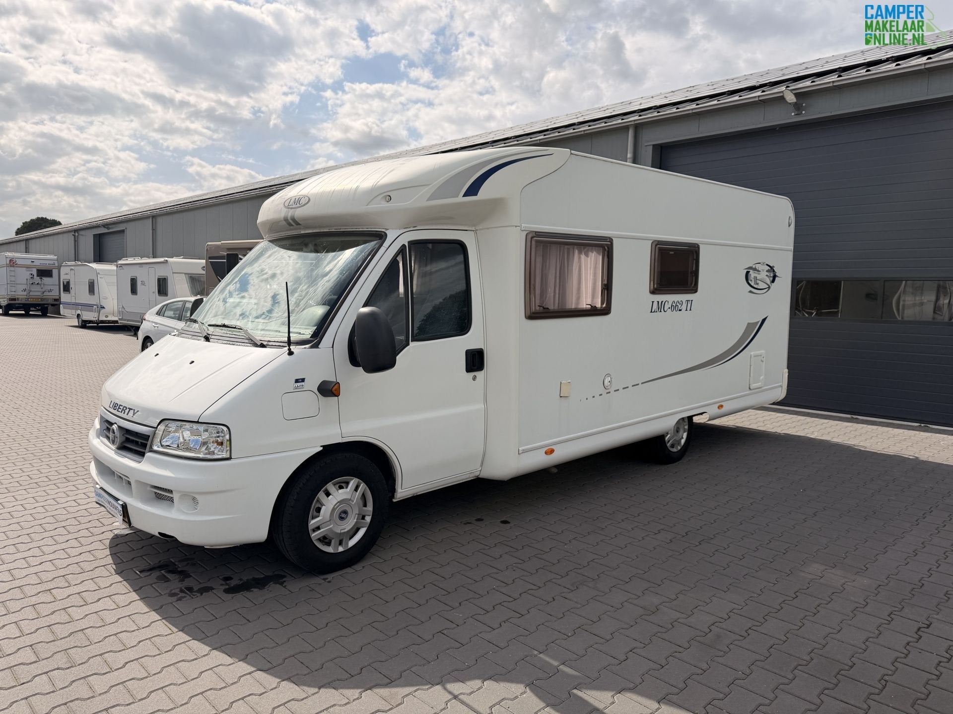 LMC Liberty 662 TI | Frans bed | Airco | Scherpe prijs!, Luifel, 6 tot 7 meter, Bedrijf, 6 tot 7 meter