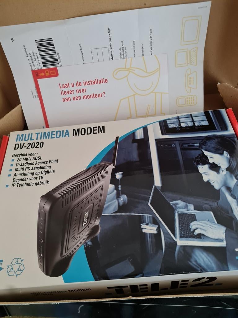 TELE2 Multimedia Modem DV-2020 met WiFi, Ophalen of Verzenden, Zo goed als nieuw, Router met modem, TELE2