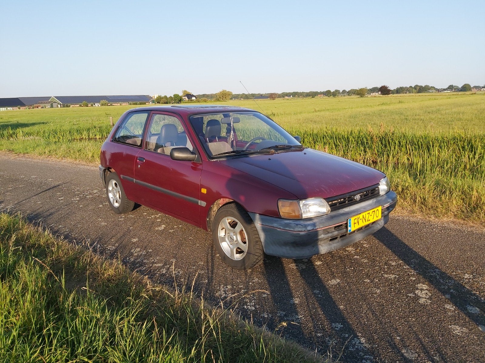 Toyota Starlet 1.3 XLI AUT E2 1992 Rood, Auto's, Toyota, 74 pk, 4 cilinders, Starlet, 400 kg