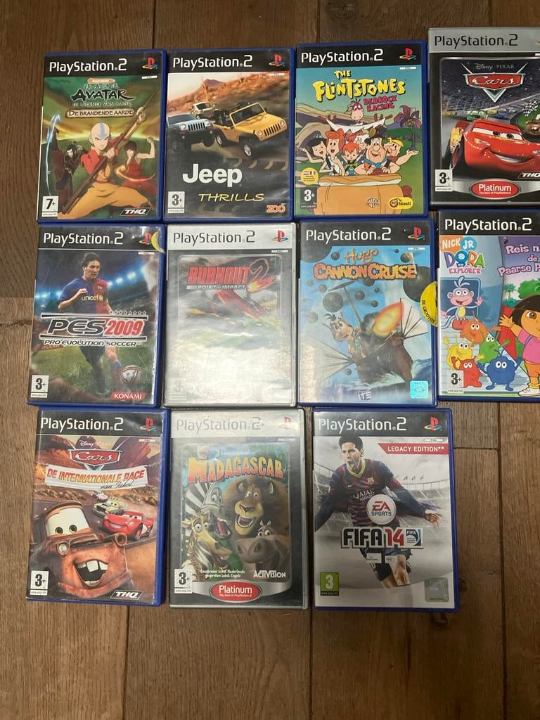 PlayStation 2 (PS2) Slim met 11 games en handleidingen, Ophalen of Verzenden, Zo goed als nieuw, Vanaf 3 jaar