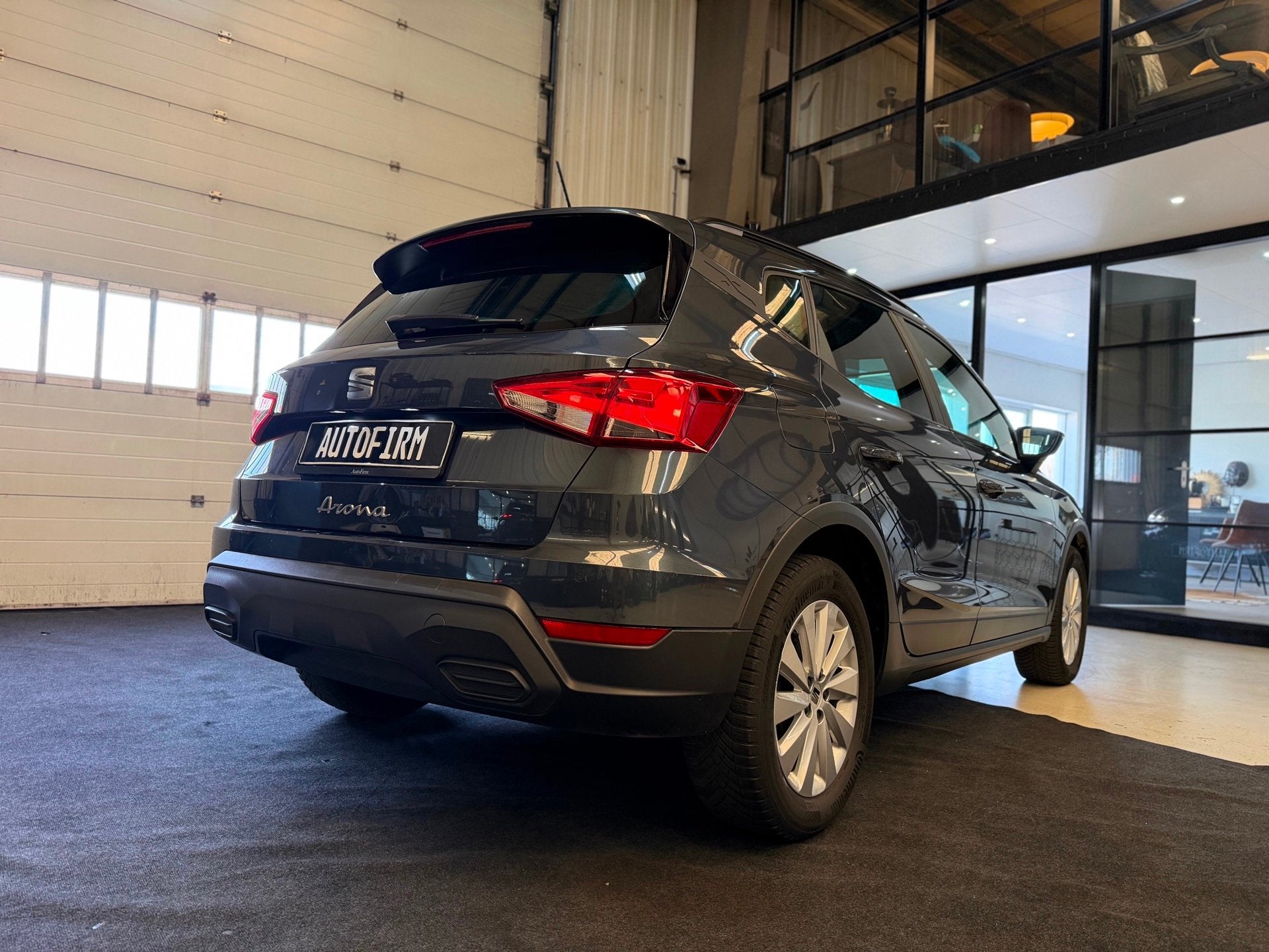 Seat Arona 1.0 TSI Style Business Intense NAP Dealer onderho, Auto's, Stof, Gebruikt, 95 pk, 49 €/maand