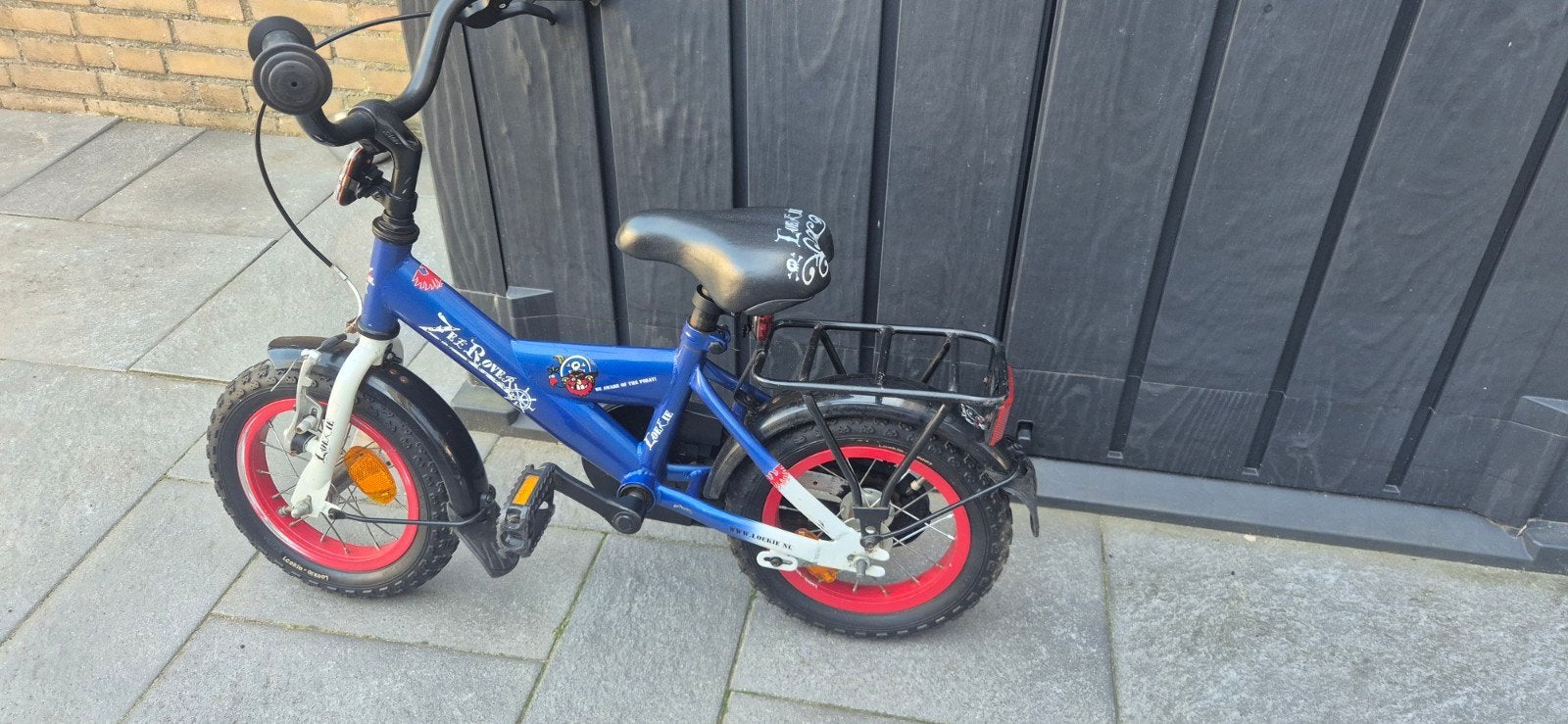 Loekie kinderfiets 12 inch met Spiderman fietshelm, Ophalen, Terugtraprem, Gebruikt, Loekie
