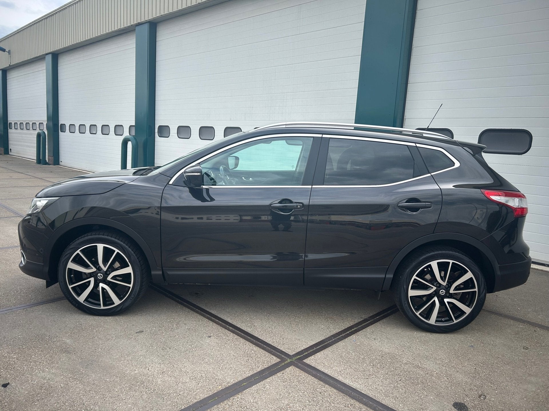 Nissan Qashqai 1.2 Tekna, Auto's, Voorwielaandrijving, Euro 5, Gebruikt, Zwart