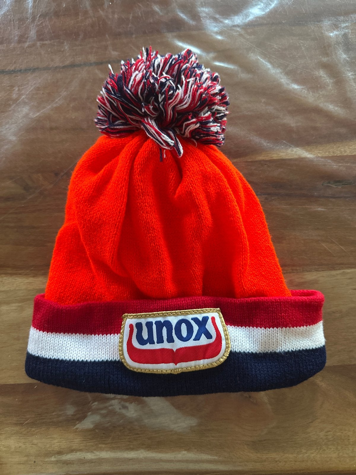 Unox Muts - Oranje met Pompon, Ophalen of Verzenden, Nieuw, Maat 46/48 (XL) of groter, Muts
