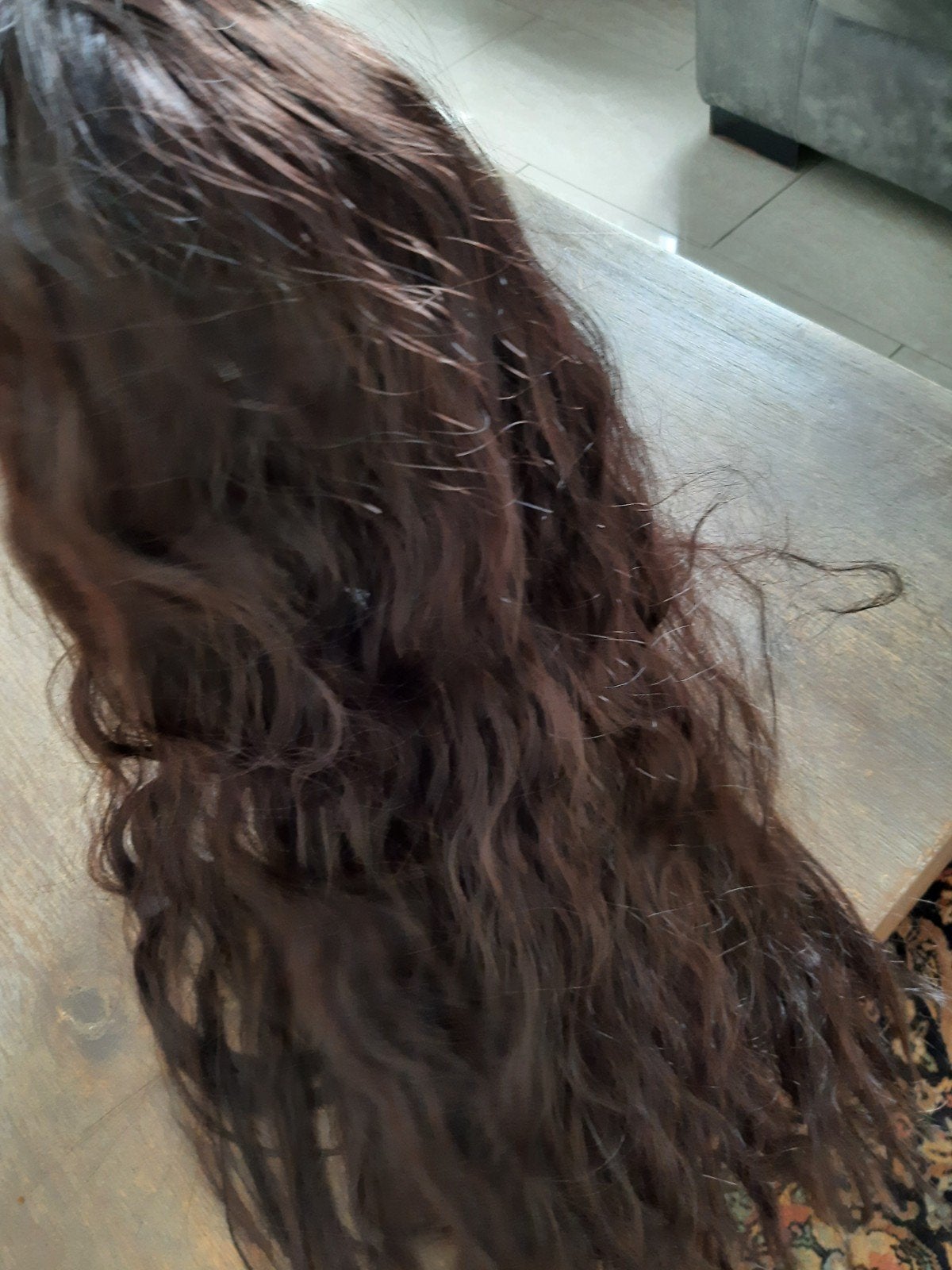 Lange donkerbruine pruik met golvend haar, Ophalen of Verzenden, Zo goed als nieuw, Pruik of Haarverlenging