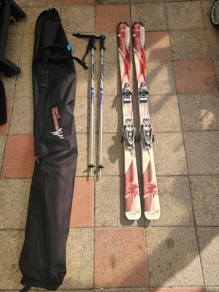 Rossignol ski's en skistokken met opbergtas, Ophalen