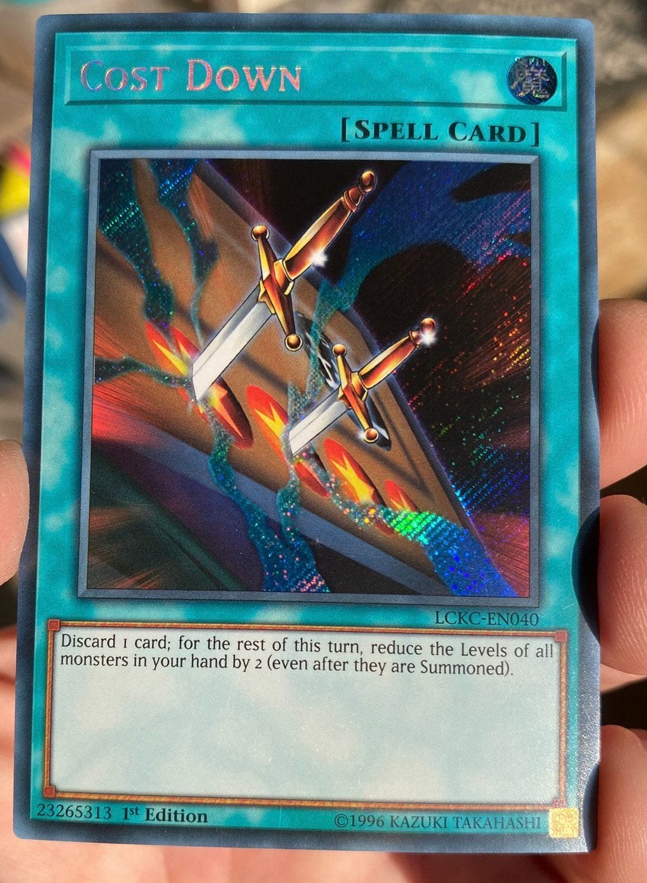 Yu-Gi-Oh! Cost Down LCKC 1st Edition !, Hobby en Vrije tijd, Verzamelkaartspellen | Yu-gi-Oh!, Zo goed als nieuw, Losse kaart