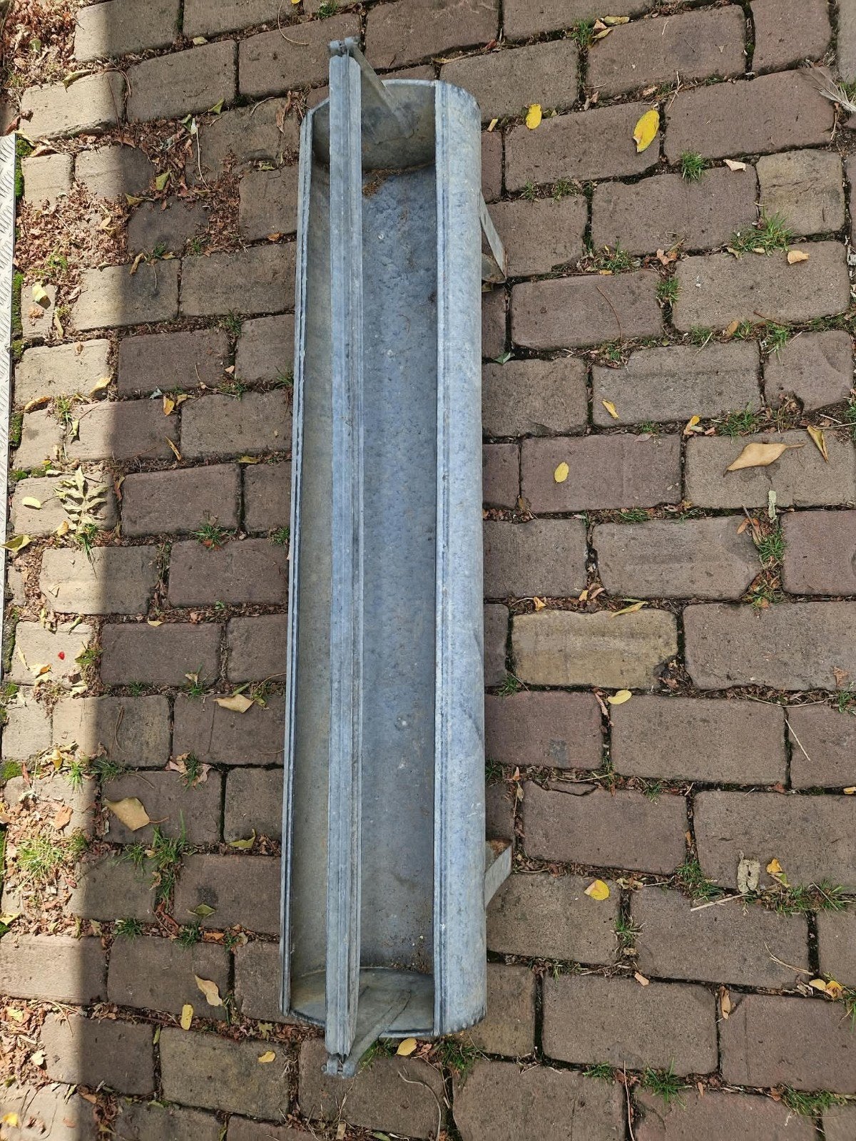 Voederbak voor kippen, Ophalen
