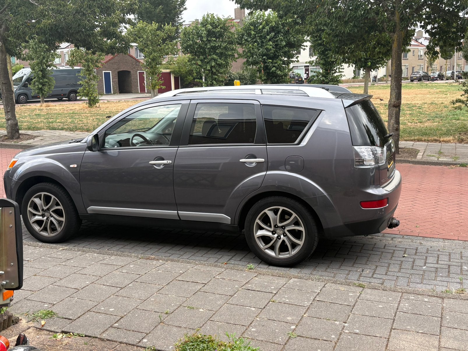 Mitsubishi Outlander 2.4 MPI  7 personen 4WD CVT 2008 Grijs, Auto's, Mitsubishi, Automaat, Outlander, Zwart, 4 cilinders